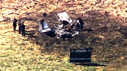 Deadly crash kills two as plane plunges into 'ball of flames' near suburban golf course Church Find