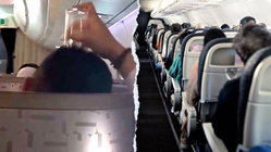 Passenger's bizarre use of drinking glass on flight leaves travelers horrified Church Find